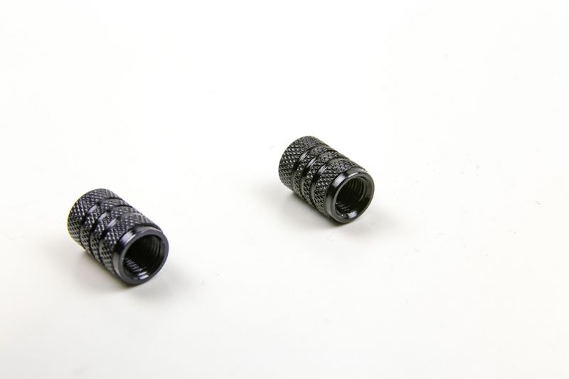 Valve cap made of black anodised aluminium